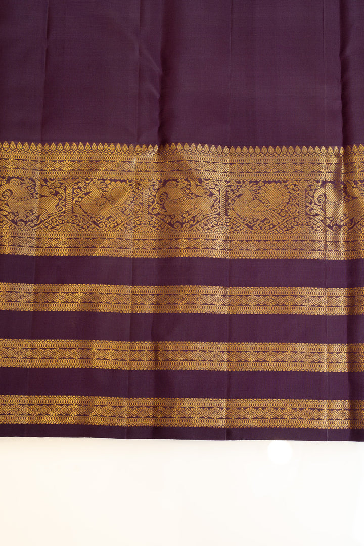 Rust maroon and purple pure Kanchipuram silk saree