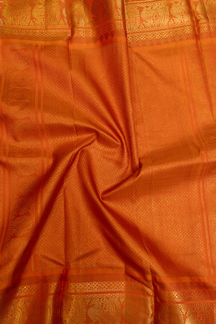 Emerald green and orange grand borders pure Kanchipuram silk saree