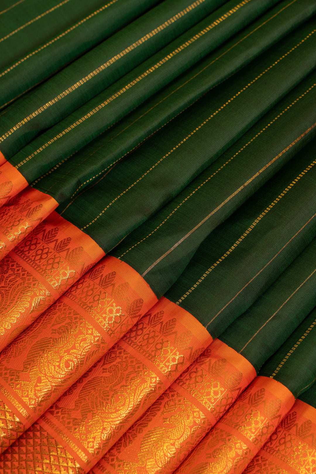 Emerald green and orange grand borders pure Kanchipuram silk saree