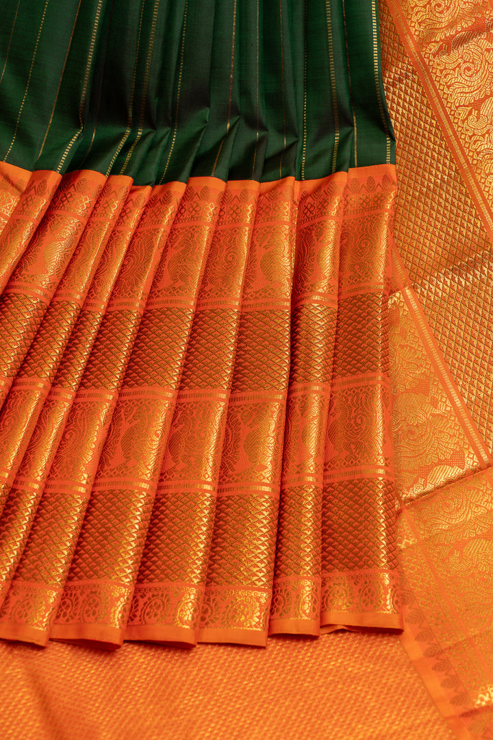 Emerald green and orange grand borders pure Kanchipuram silk saree