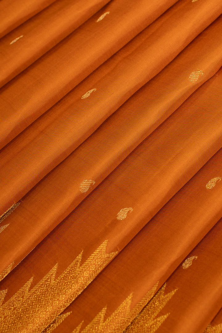 Rust orange temple border pure Kanchipuram silk saree