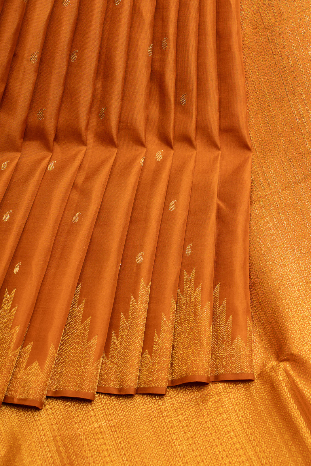 Rust orange temple border pure Kanchipuram silk saree