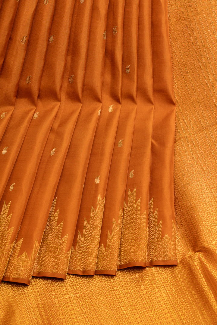 Rust orange temple border pure Kanchipuram silk saree