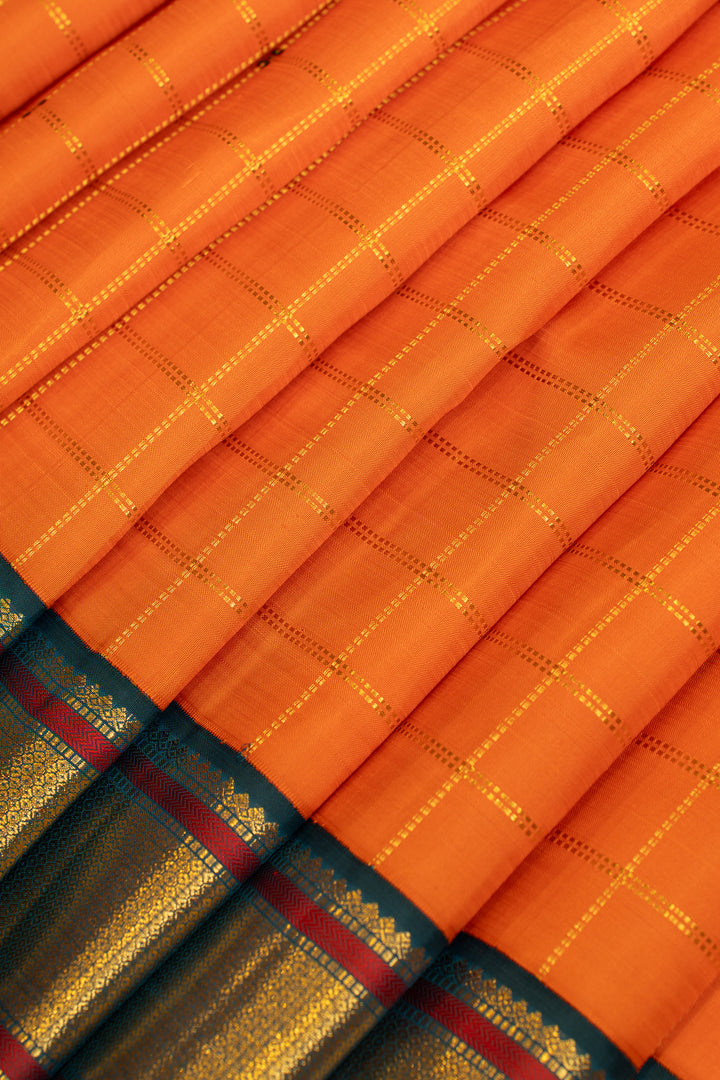 Orange and peacock green vintage checks pure Kanchipuram silk saree
