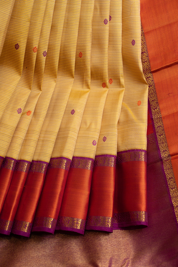 Pastel yellow thread stripes  pure Kanchipuram silk saree