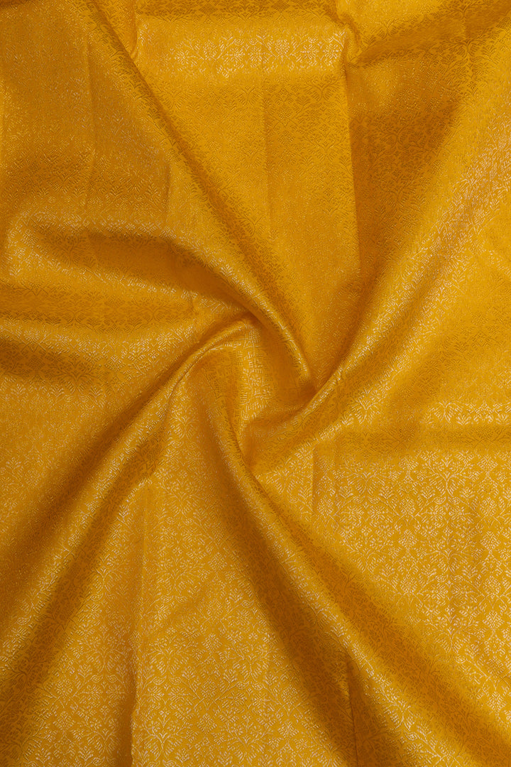 Yellow self brocade  pure Kanchipuram silk saree