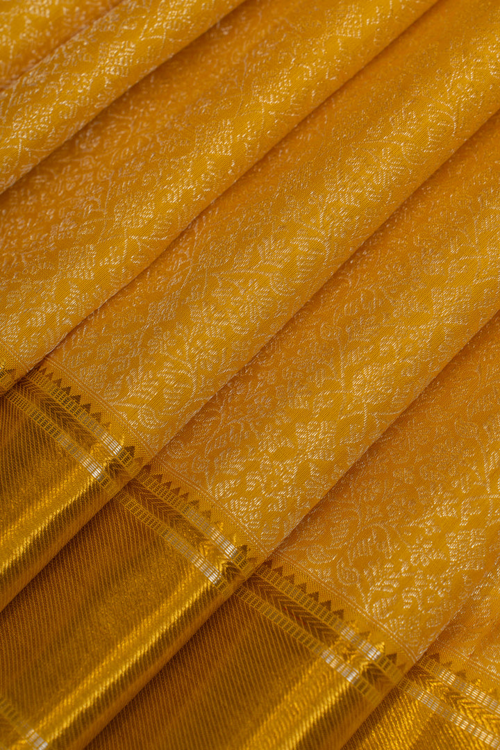 Yellow self brocade  pure Kanchipuram silk saree