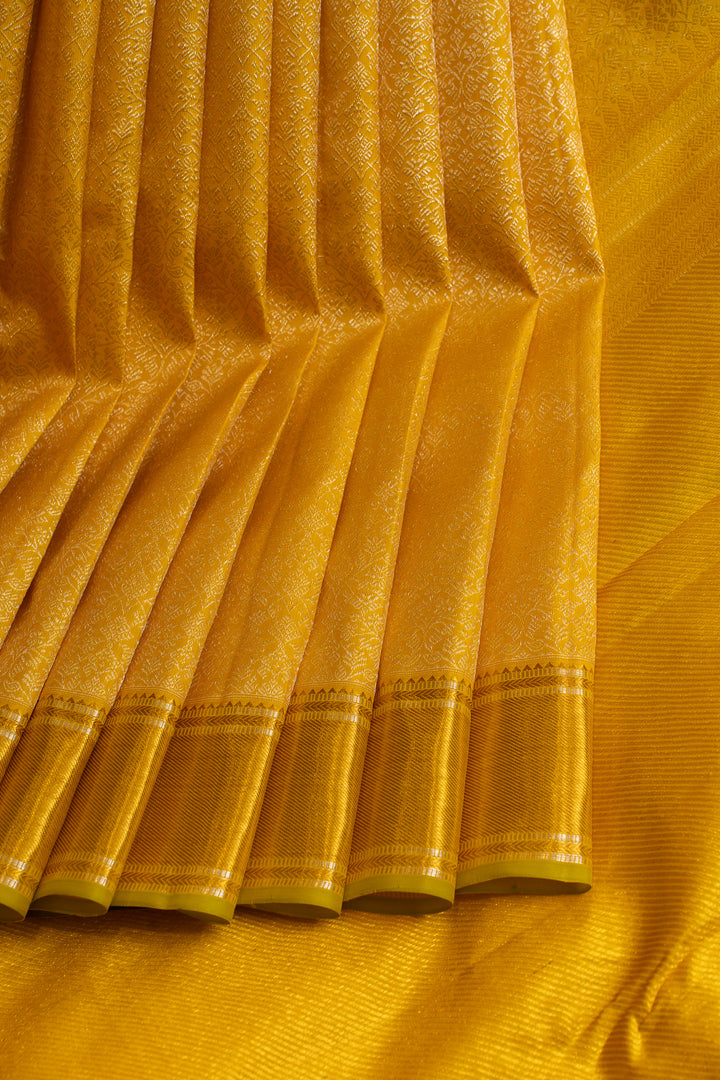 Yellow self brocade  pure Kanchipuram silk saree