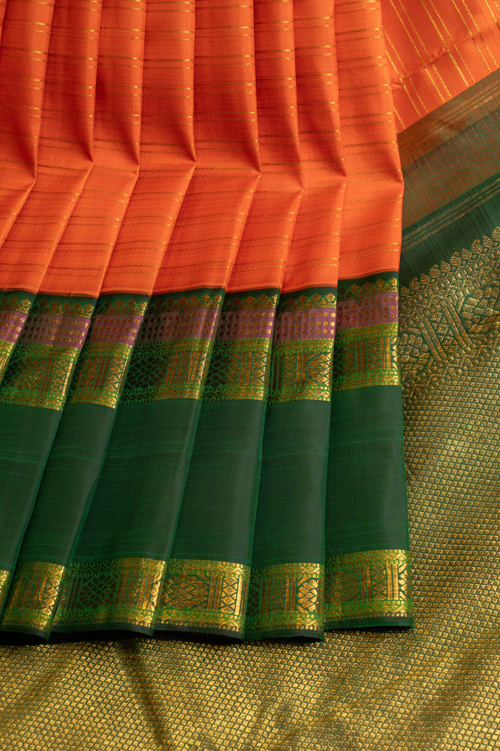 Orange and green stripes  pure Kanchipuram silk saree