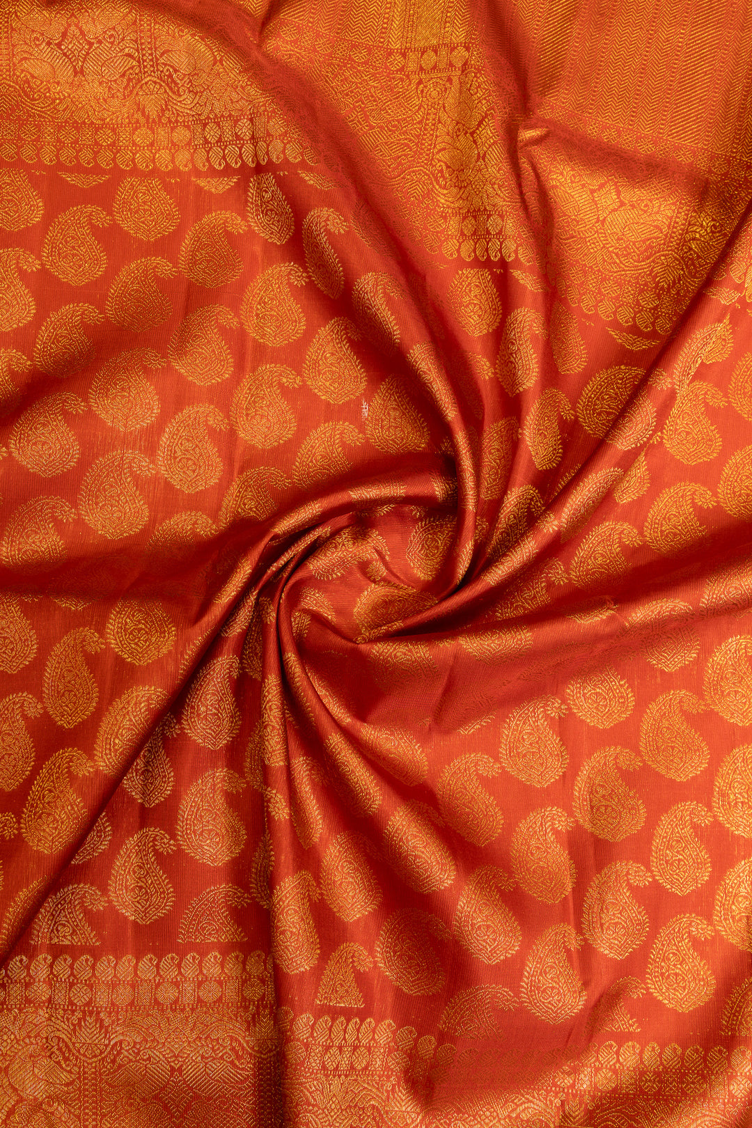 Rust orange paisley pure Kanchipuram silk saree