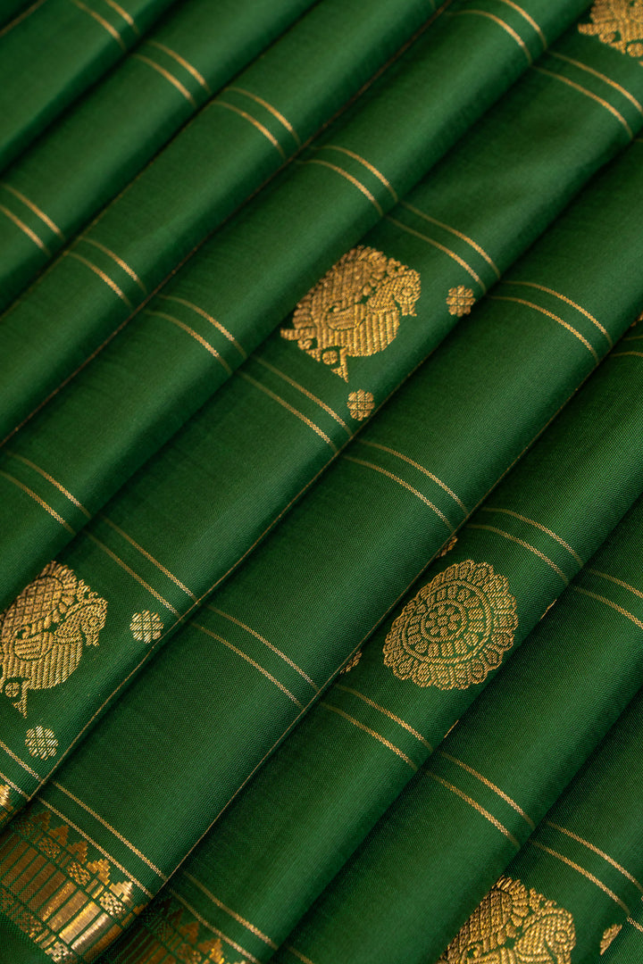 Emerald green traditional small border pure Kanchipuram silk saree