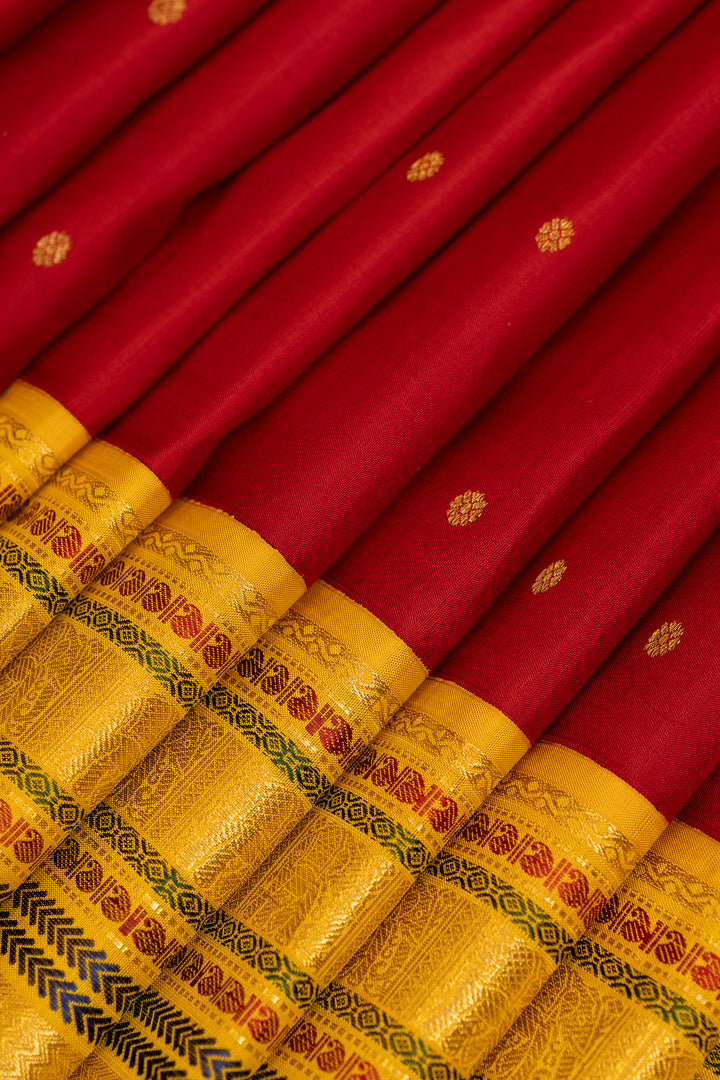 Maroonish pink and yellow varisaipettu pure Kanchipuram silk saree