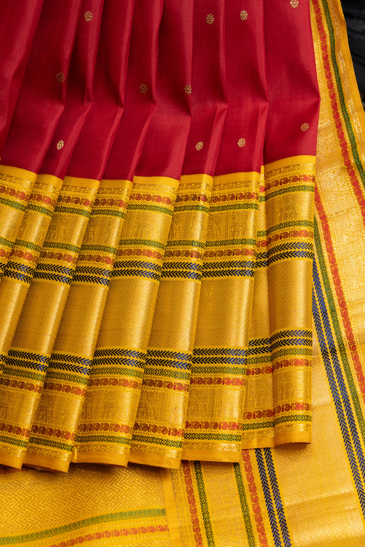 Maroonish pink and yellow varisaipettu pure Kanchipuram silk saree