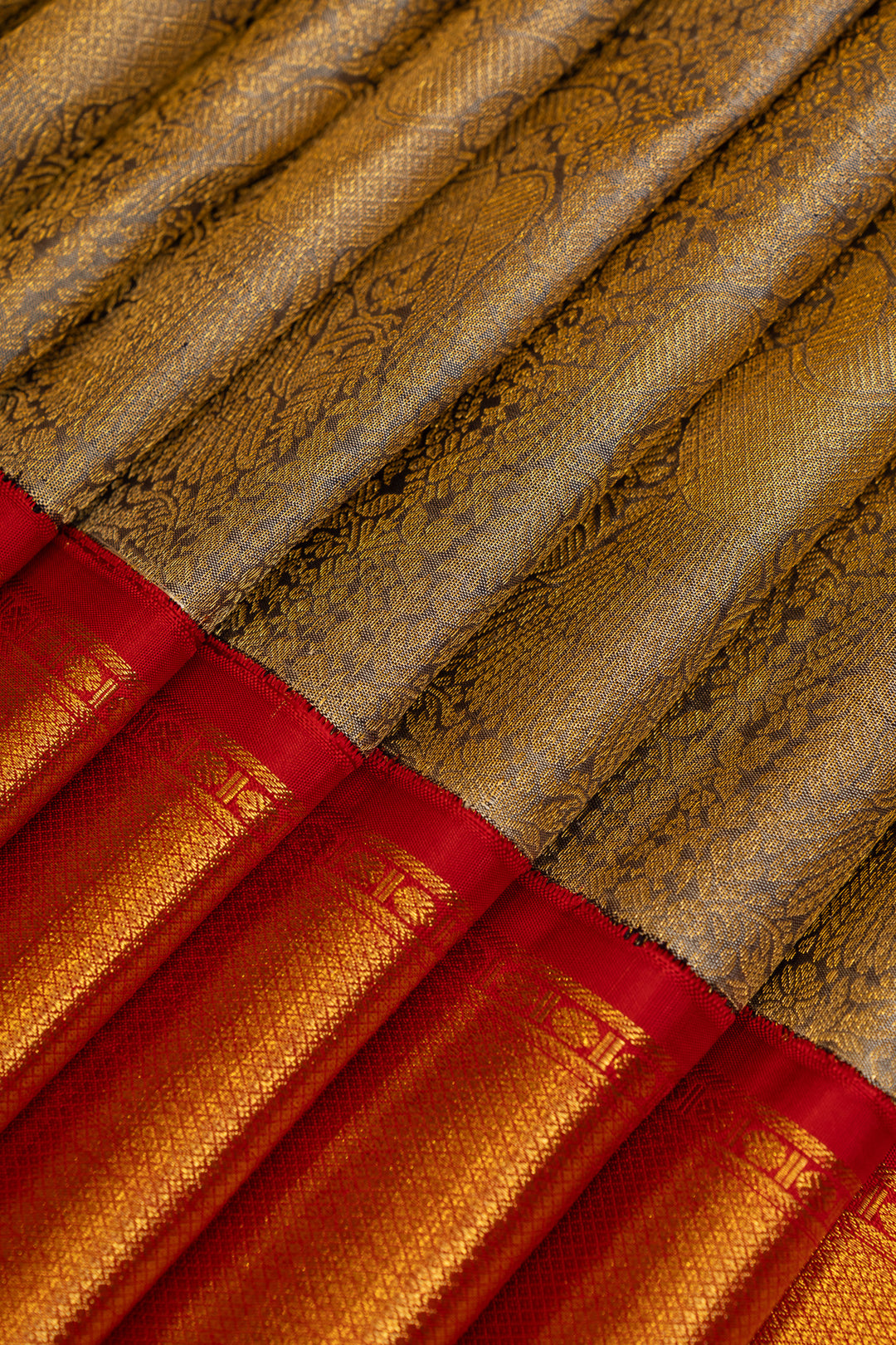 Greyish gold iruthalaipakshi brocade pure Kanchipuram silk saree