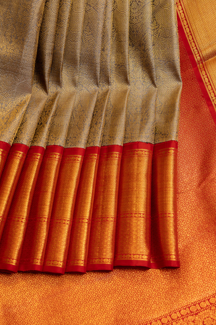 Greyish gold iruthalaipakshi brocade pure Kanchipuram silk saree
