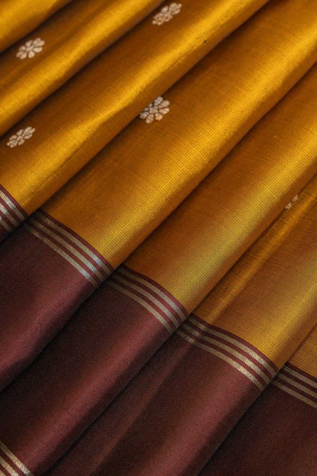 Mustard and maroon pure soft silk saree