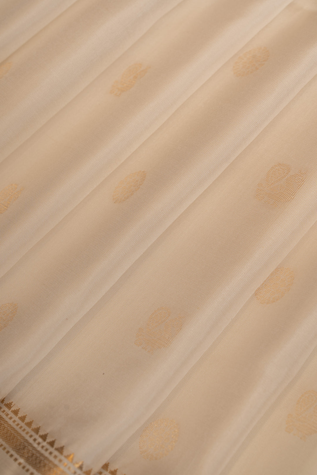 Off white and gold traditional pure soft silk saree