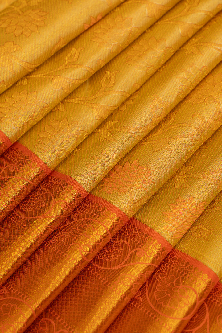 Golden yellow and peach brocade pure Kanchipuram silk saree