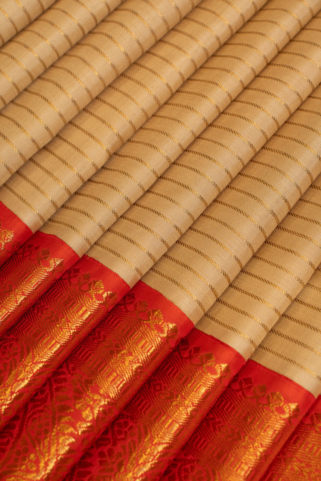 Champagne gold and red pure Kanchipuram silk saree