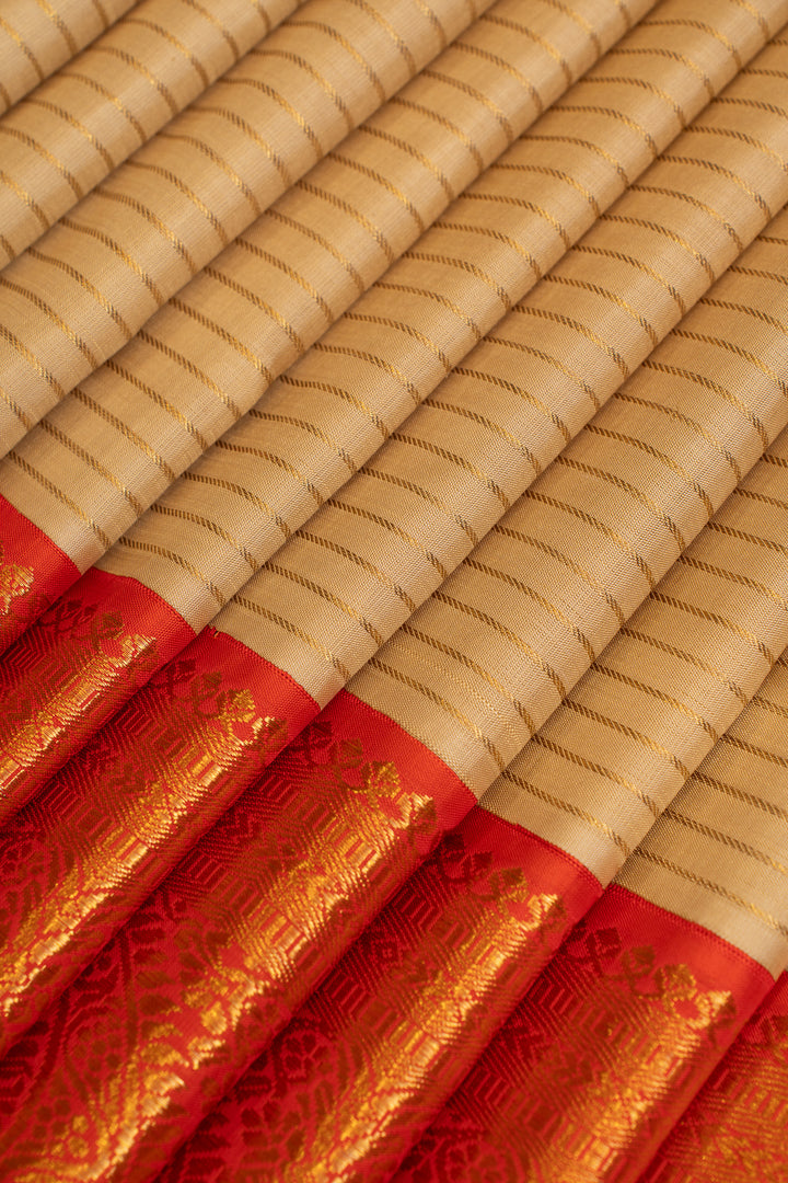 Champagne gold and red pure Kanchipuram silk saree