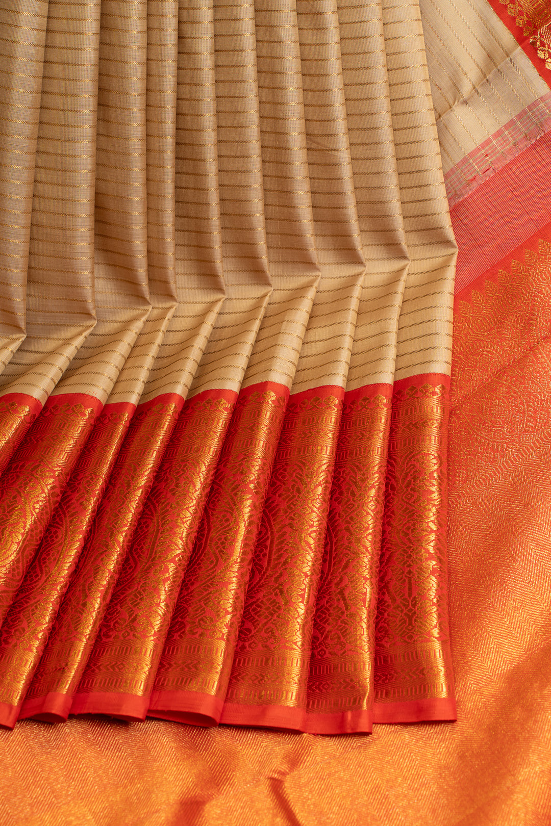 Champagne gold and red pure Kanchipuram silk saree