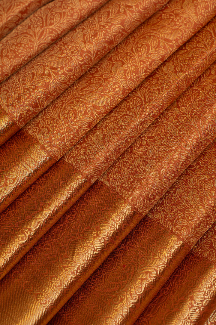 Rust orange floral brocade pure Kanchipuram silk saree