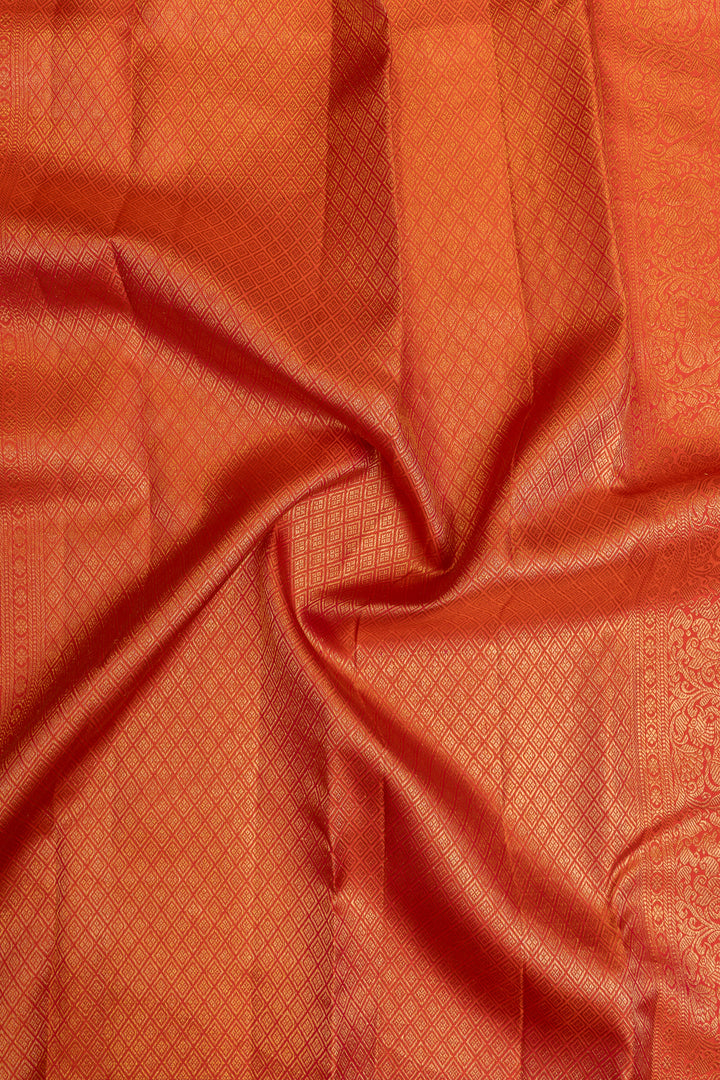 Reddish orange brocade pure Kanchipuram silk saree