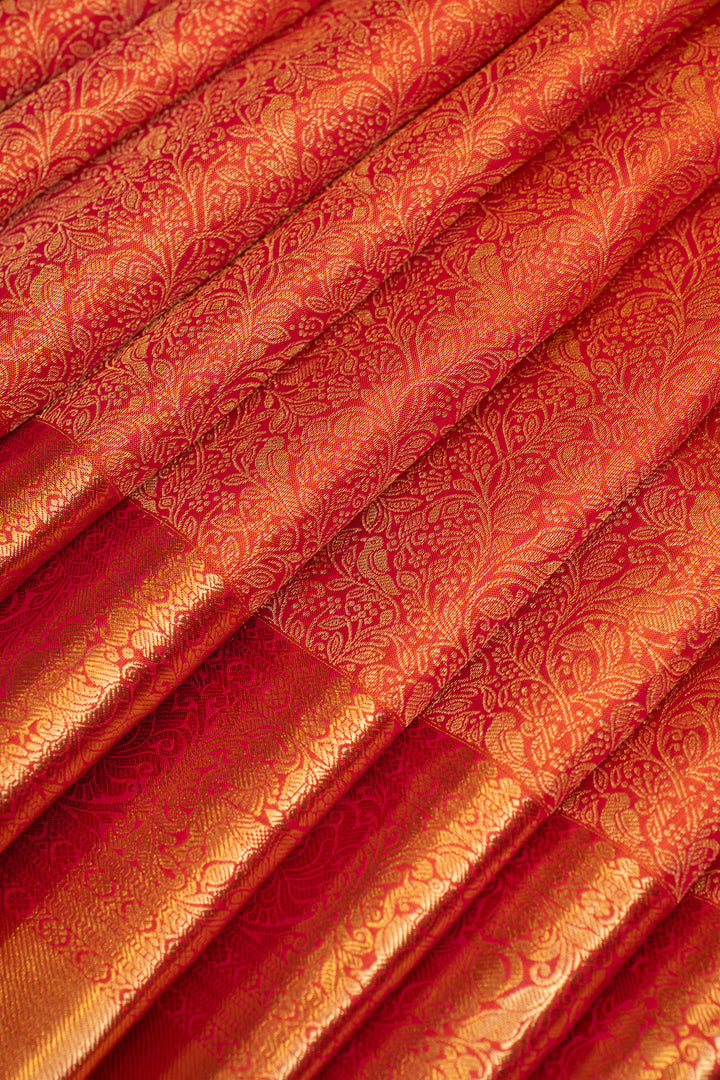Reddish orange brocade pure Kanchipuram silk saree