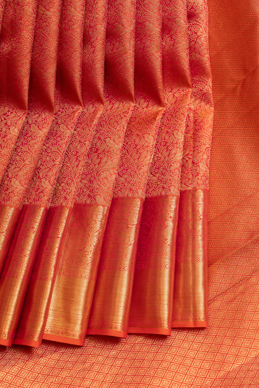 Reddish orange brocade pure Kanchipuram silk saree