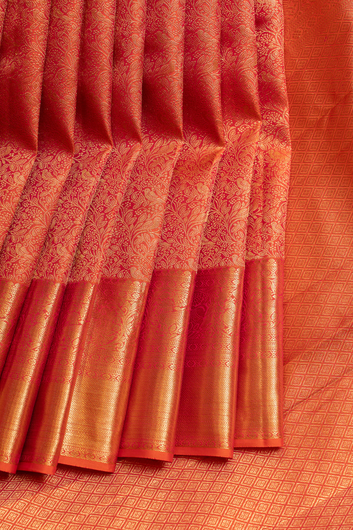 Reddish orange brocade pure Kanchipuram silk saree