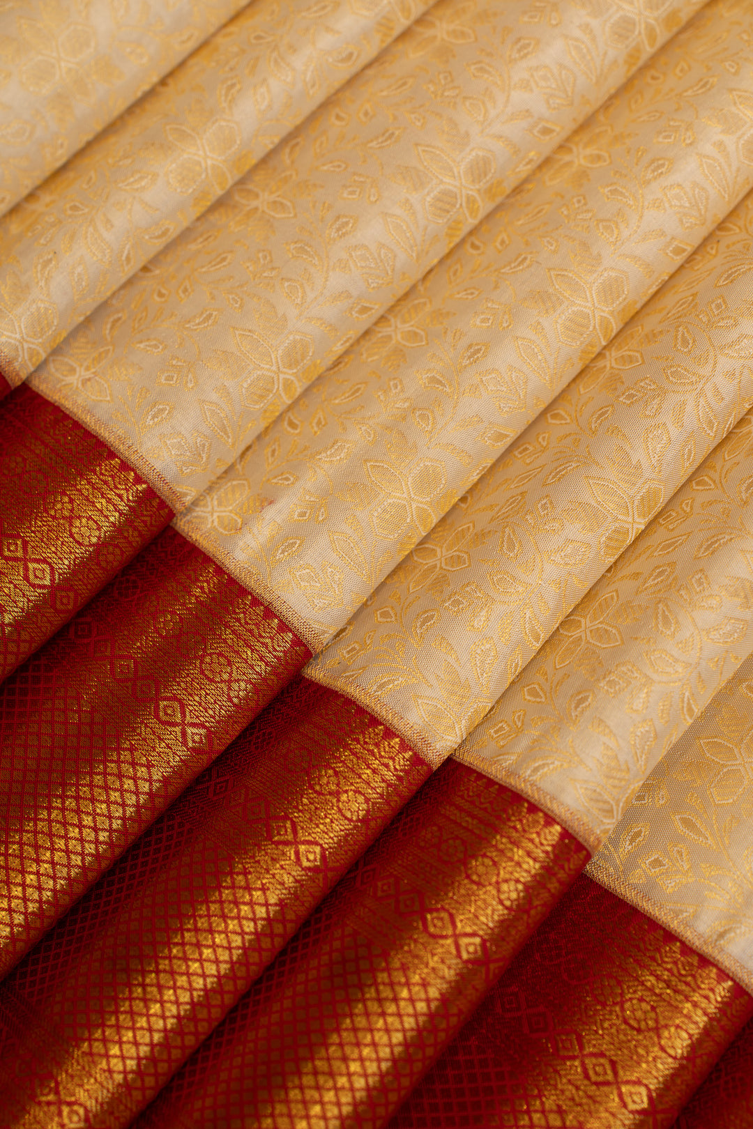 Ivory and red floral brocade pure Kanchipuram silk saree