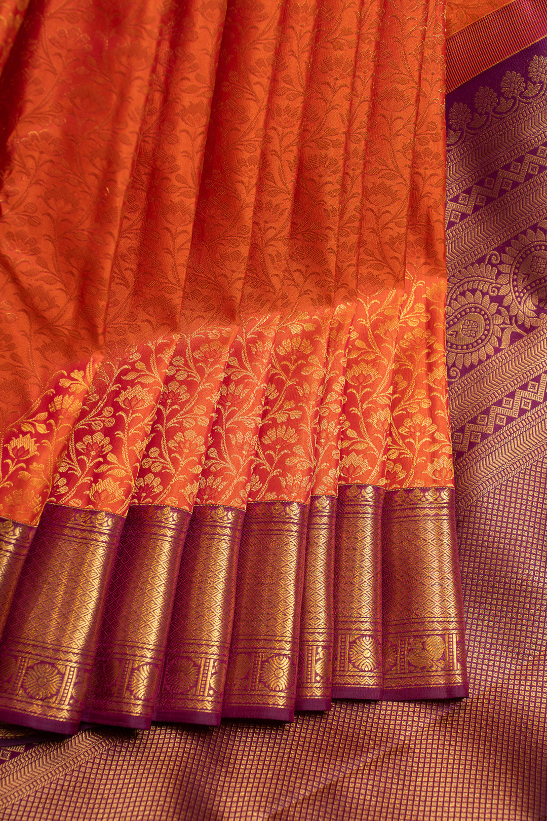 Orange and purple floral brocade pure Kanchipuram silk saree