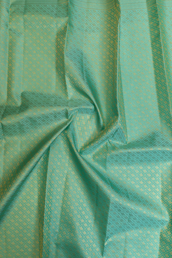 Turquoise blue and pink brocade pure Kanchipuram silk saree