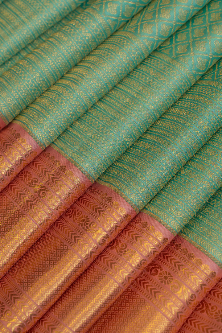 Turquoise blue and pink brocade pure Kanchipuram silk saree