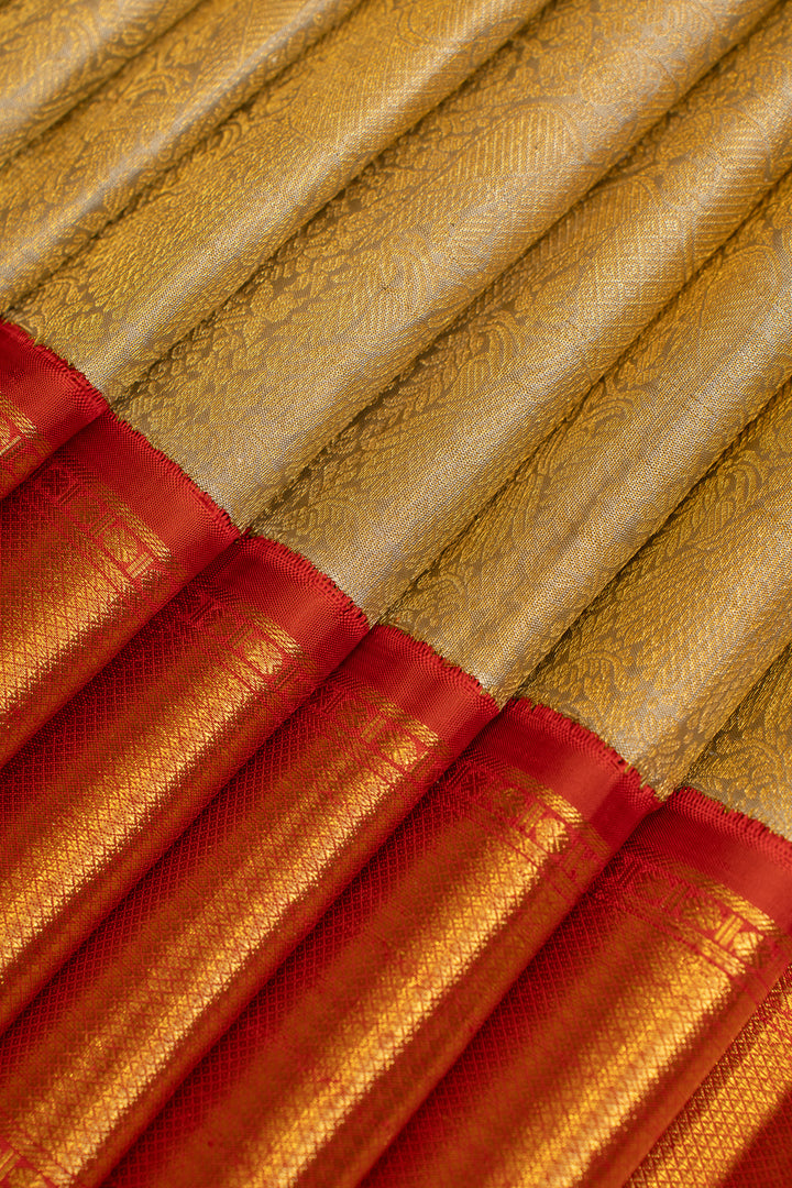 Silverish gold and red iruthalaipakshi brocade pure Kanchipuram silk saree
