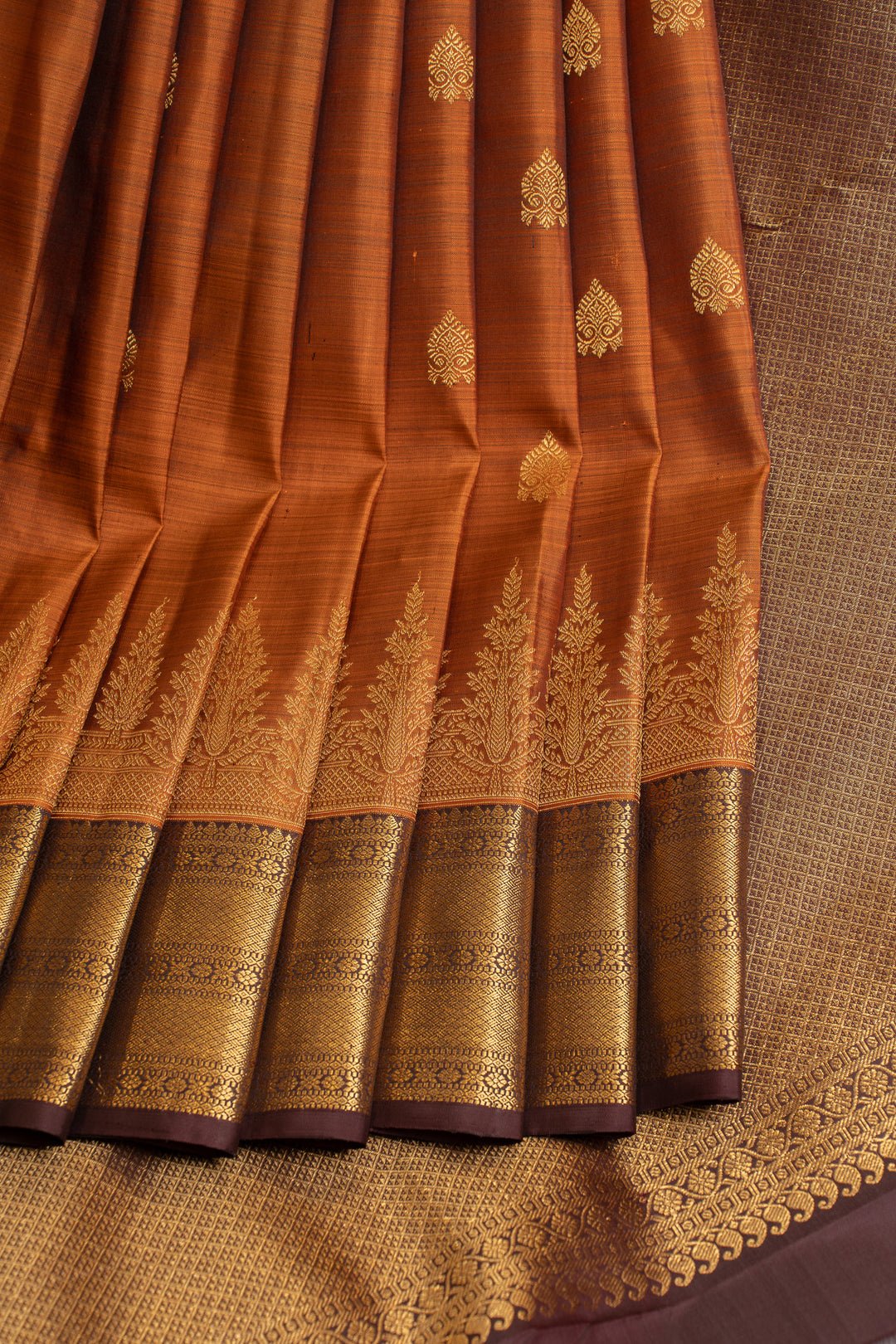 Rust orange turning border pure Kanchipuram silk saree