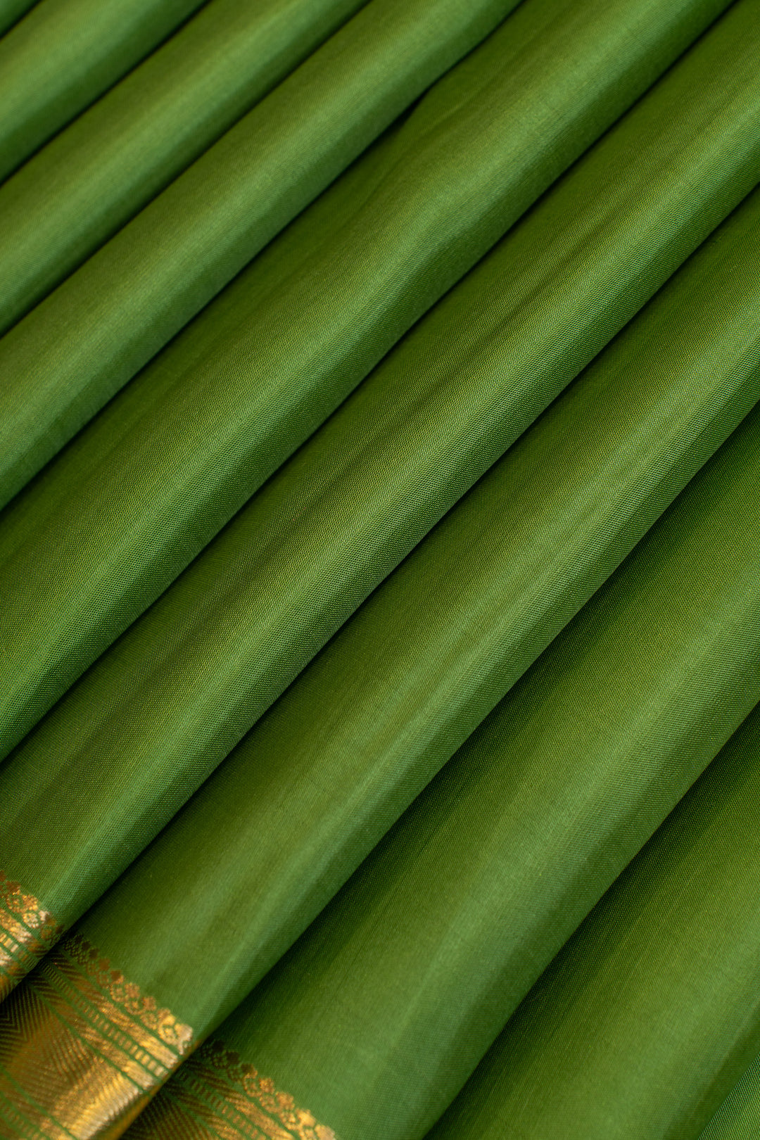 Pine green small border pure Kanchipuram Silk saree
