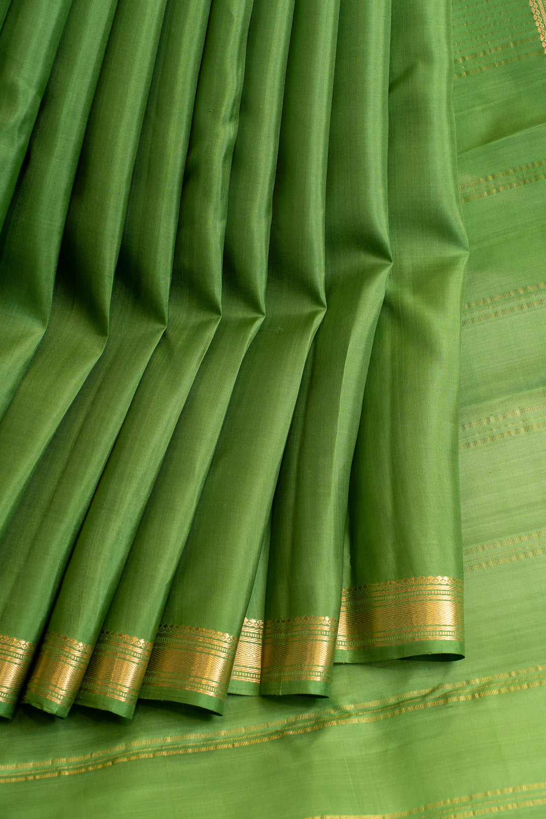 Pine green small border pure Kanchipuram Silk saree