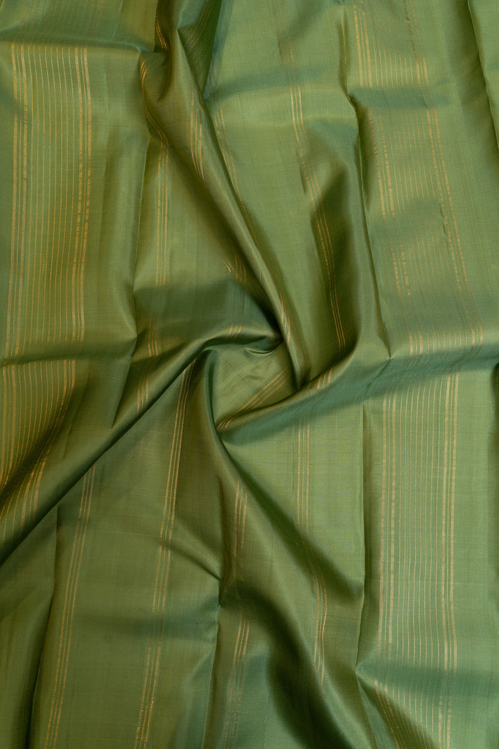 Green small border pure Kanchipuram silk saree