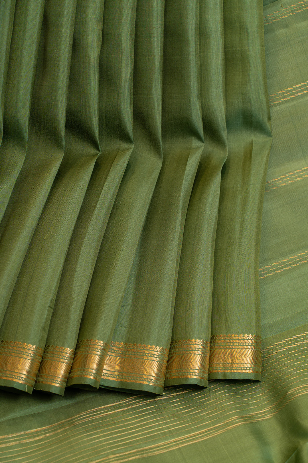 Green small border pure Kanchipuram silk saree