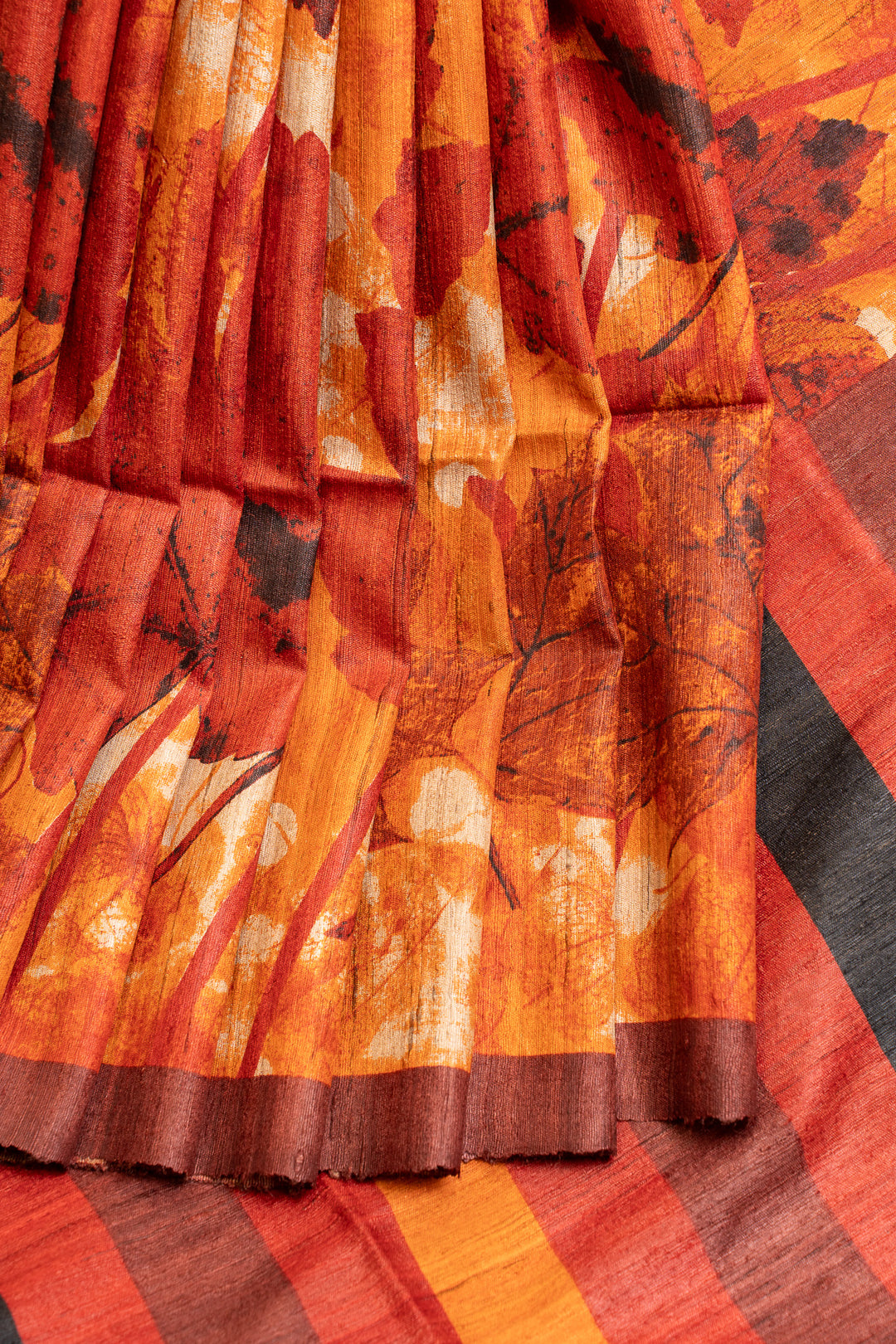 Orange handprinted pure Tussar saree