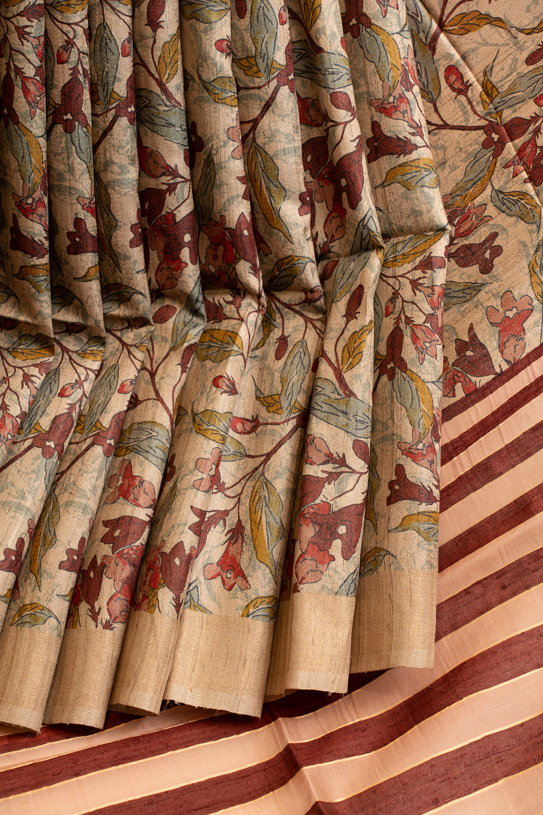 Beige and maroon handprinted pure Tussar saree