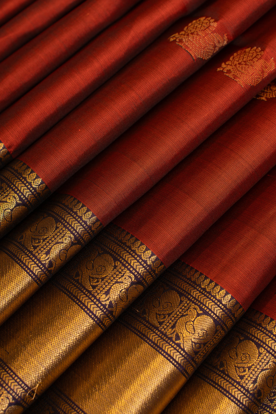 Rust orange and purple pure soft silk saree