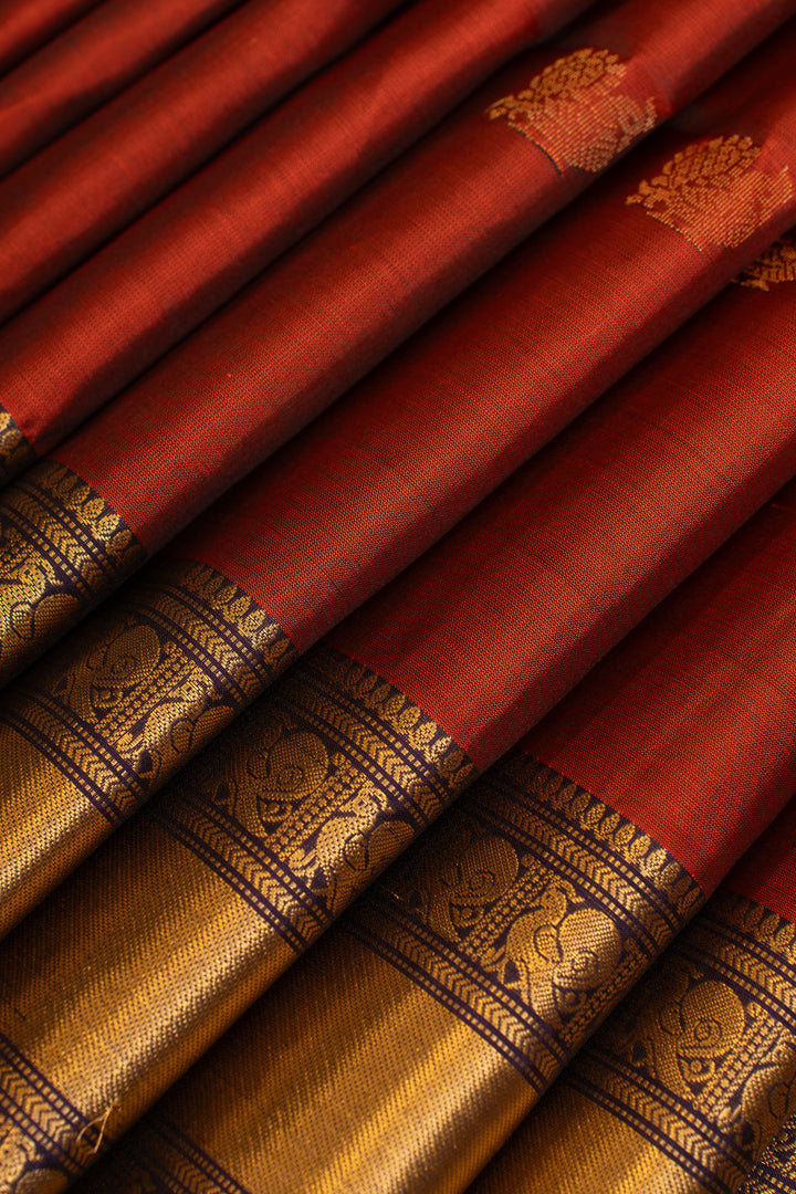 Rust orange and purple pure soft silk saree