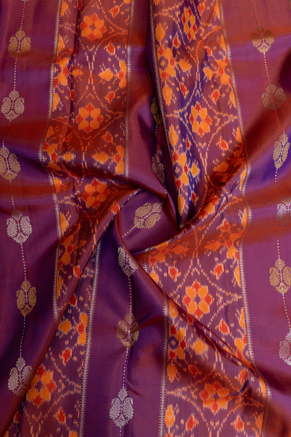 Purple borderless pure ikat Kanchipuram silk saree