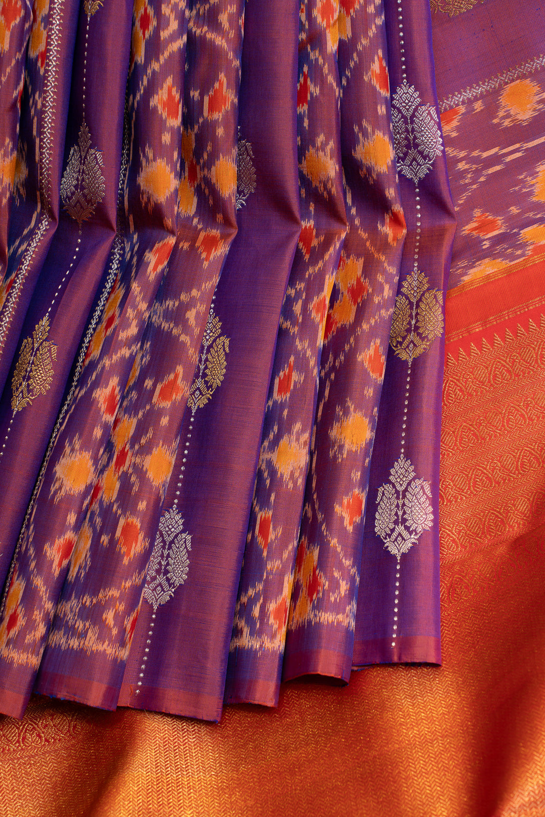 Purple borderless pure ikat Kanchipuram silk saree