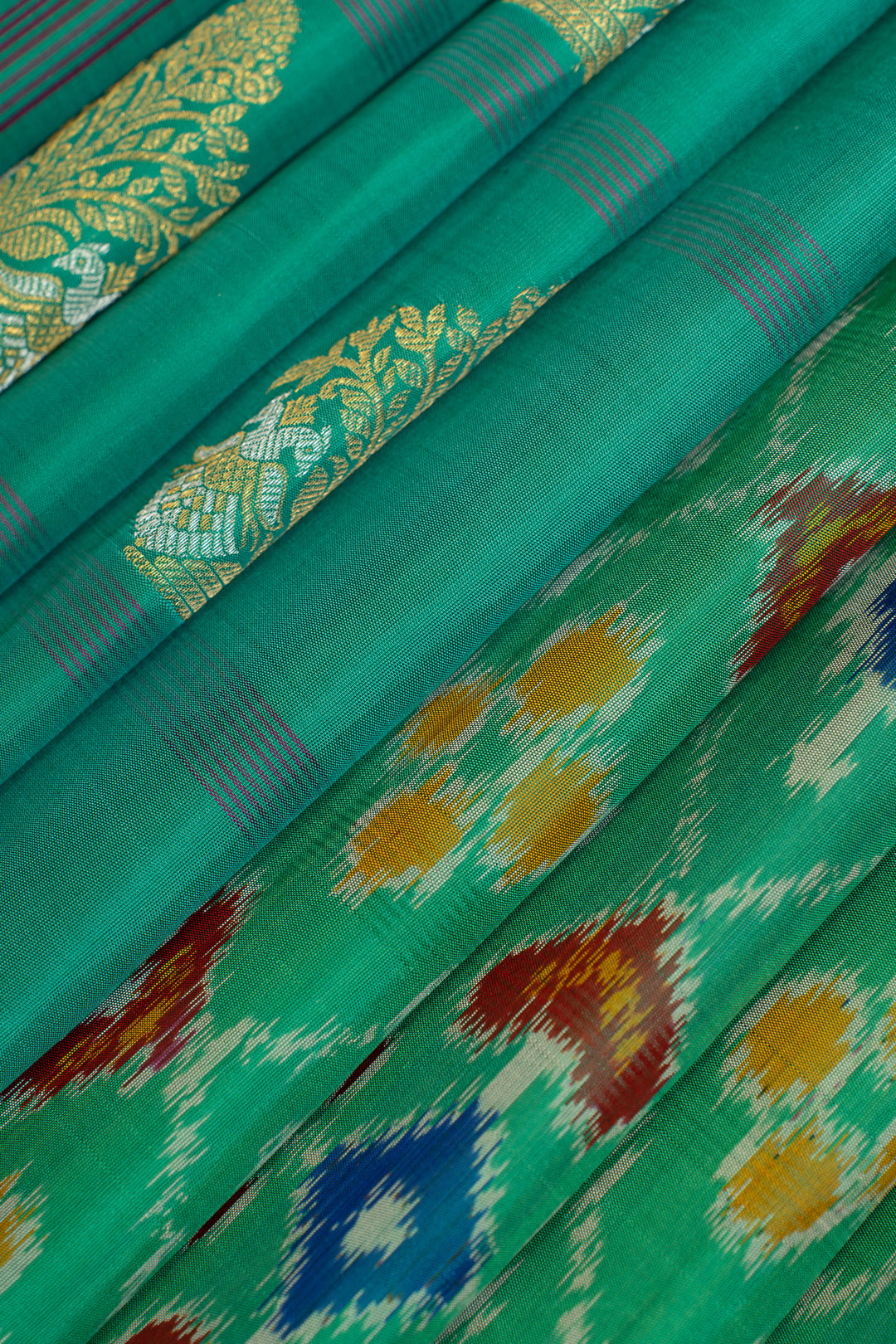 Cyan blue checks ikat partly pure Kanchipuram silk saree