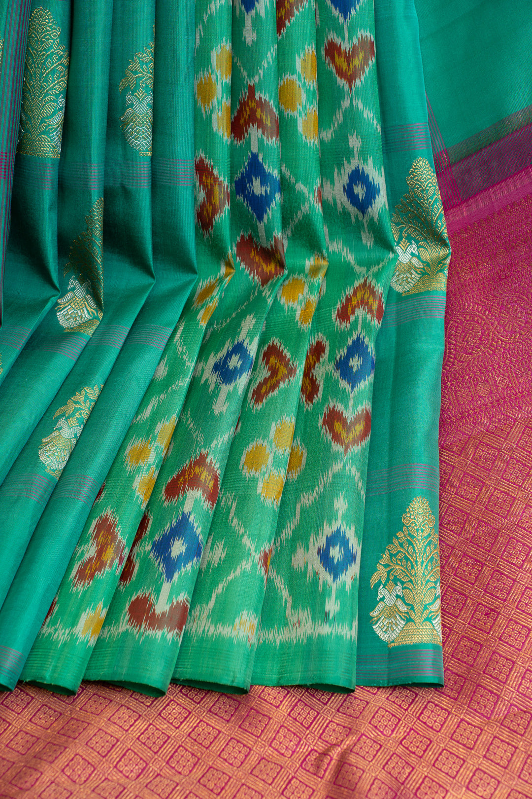 Cyan blue checks ikat partly pure Kanchipuram silk saree
