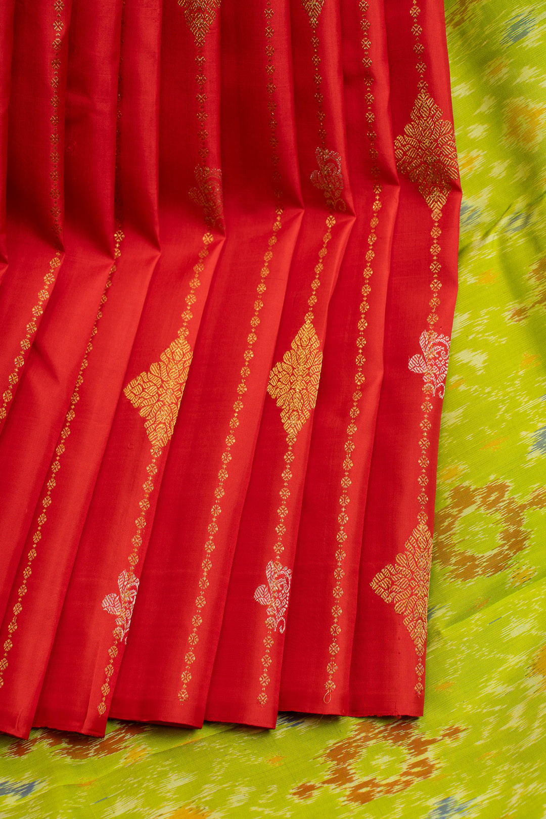 Red and green borderless ikat Kanchipuram pure silk saree