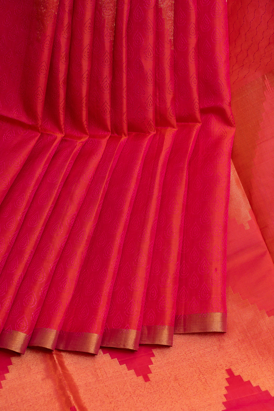 Magenta embossed pure soft silk saree